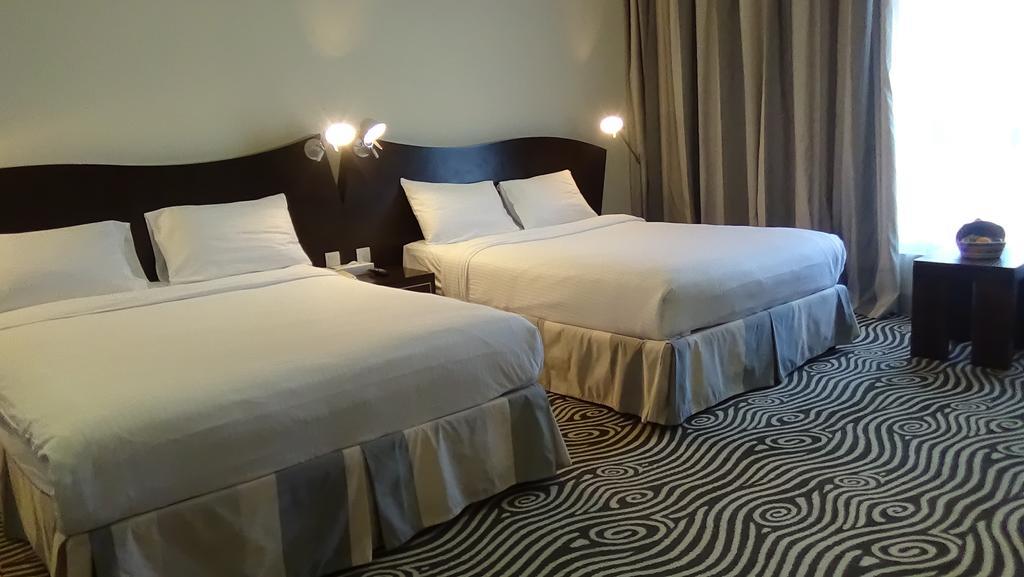 Al Raya Suites Hotel Манама Экстерьер фото