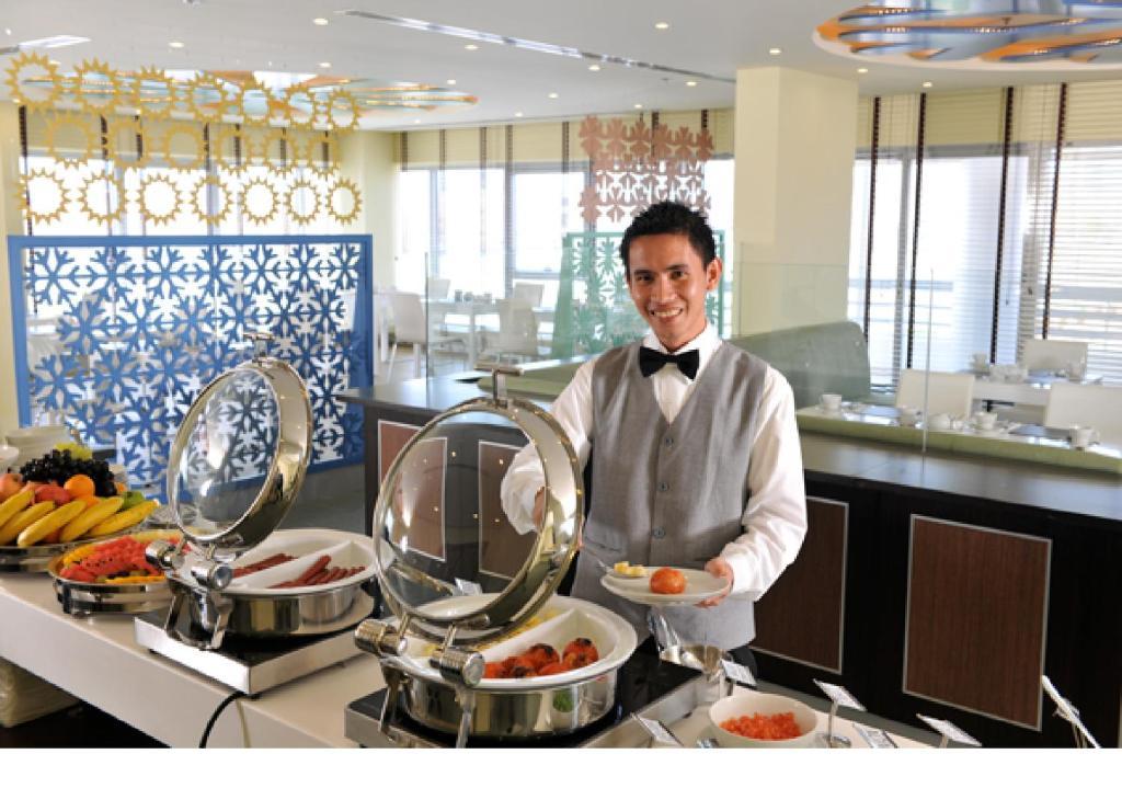 Al Raya Suites Hotel Манама Экстерьер фото
